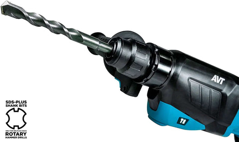 Side view of a blue and black SDS-Plus rotary hammer drill with carbide-tipped drill bit installed