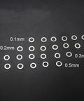 Top Shelf M8 Steel Shim Washers Set Eighty Pieces Precision Ultra Thin Spacers for Electronics showing 0.1mm to 0.5mm thicknesses.