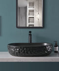 Matte Black Oval Vessel Sink 23.5 By 15.7 Inches, Ceramic Countertop Bathroom Basin With Pop Up Drain, Modern Sleek Design For Vanity