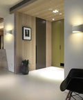 Modern interior with Dope LED Wall Sconce Light 7W Warm White 2700K Up And Down Plaster Finish Indoor Wall Lamps illuminating hallway