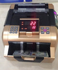 Fast Track Bill Counter With Snappy UV And Magnetic Fake Detection Slick Anti Counterfeit Alarm Heavy Duty Money Machine For Us Currency and Global Cash, showing control panel and bills.