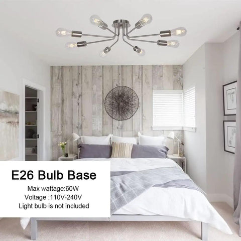 Mid Century 8 Light Chandelier in Brushed Nickel in a modern bedroom, E26 bulb compatible, semi flush mount ceiling light.
