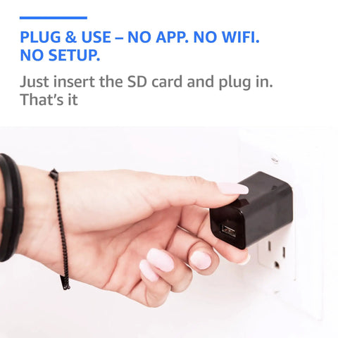 Hand plugging in a Plug-In Indoor Camera With No WiFi Needed, Full HD 1080P Clarity, 110 Degree Wide View, Motion Detection, Continuous Recording Via MicroSD Up To 512GB, Easy Plug-And-Play Setup For Home, Nanny And Pet Monitoring into a wall socket