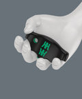 Hand holding Kraftform Kompakt 400 RA Imperial Set 1 T Handle Bit Holder with Ratchet Function, black and green details.