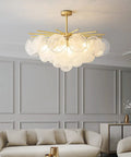 Showstopper Modern Luxury Crystal Rain Drop Chandelier Pendant Light Fixture For Bedroom Dining Room Living Room Kitchen Island With Glass Shell Bead Design Bulb Not Included E14 Compatible, gold-tone finish with glass beads in living room.