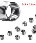 Close-up view of stainless steel M5 x 0.8 mm thread inserts from the M5 X 0.8 Thread Repair Kit with 25 Stainless Steel Inserts.
