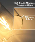 Top Shelf Four Light Bathroom Vanity Fixture With Slick Matte Black Frame And Knockout Clear Glass Shades Prime Wall Sconce showing the 2.5mm thick clear glass.