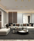 Badass 3 Inch Brass Recessed Downlights Featuring Sleek Baffle Trim And Solid Copper Build For Dead On Precision These 7 Watt 4000K fixtures illuminating a modern living room.
