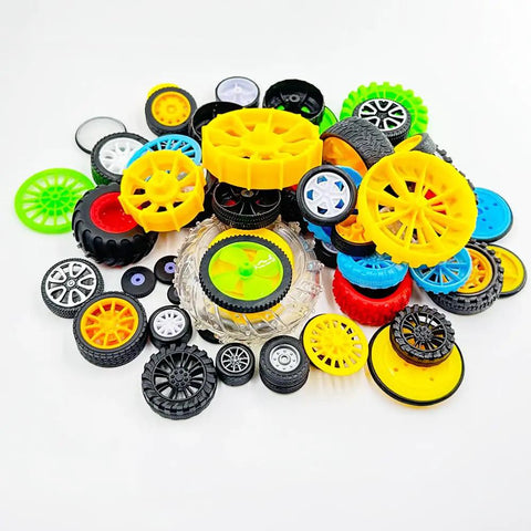 Assorted 56 Piece RC Car Wheel Set with rubber and plastic tires, metal shaft axles, various sizes, for DIY model builds.