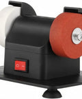 Compact Bench Top Grinder With Rock Solid Base Dual Sharpening Wheels showing white and red wheels and power switch.