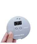 Ultra Slim UV Radiometer For UV LED Light Sources That Measures UV Intensity Energy And Temperature At The Same Time UVA Range 340 420nm Compact Portable Light Meter For Tight Spaces And Photography, round gray handheld UV energy meter shown front view