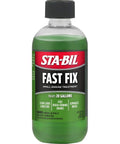 Kickstart Your Rig Small Engine Fuel Treatment And Carb Cleaner in green bottle, treats 20 gallons for quick small engine repair.