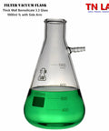 1L heavy wall borosilicate glass vacuum flask with green liquid, part of 80mm Porcelain Buchner Funnel And 1L Heavy Wall Borosilicate Glass Vacuum Flask Filtration Kit With Sealing Adapter For Efficient Lab Filtration And Easy Setup.