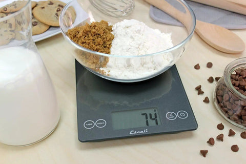 Glass Digital Kitchen Scale With 15 Pound Capacity, Big Backlit Display, Easy Touch Controls, Nutrition And Calorie Counter For Baking And Cooking, 0.1 Oz Or 1 g Accuracy, 9 By 6.5 Inch, Gray Storm showing 74 grams with flour and sugar in a bowl