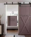 5 Feet Ceiling Mount Sliding Barn Door Hardware Kit For A 30 Inch Wide Single Wooden Door Easy To Install Smooth Quiet Operation Y Shape Hanger Heavy Duty Steel With Anti Corrosion Finish Pre Drilled Rails And L Bracket installed view showing heavy-duty steel rail and wooden barn door in modern room setting.