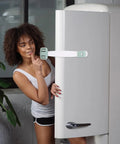 Person demonstrating Five Pack Kidproof Cabinet Locks With Double Press Buckles ABS Build 360 Degree Rotation on fridge door