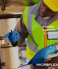 Person wearing SafeGrip SG375 Extra Thick Disposable Latex Gloves With Textured Fingertips For Automotive And Life Sciences For Food Handling Blue Small, showing extended protection.