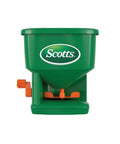 Front view of hand powered spreader for grass seed and lawn fertilizers salt and ice melt, adjustable arm spreader in green color.