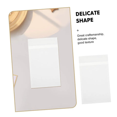 Translucent Glassine Envelopes 200 Pack 9x12 Plus 3cm Frosted Paper Bags displayed on table, showcasing delicate shape and texture.
