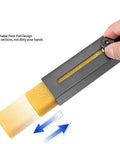 Hand using Pro Grade Natural Rubber Sandpaper Cleaning Stick with telescoping debris eraser for sanding belts and discs.