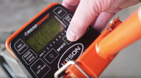 Built Tough Electronic Measuring Wheel With Spoked Steel Frame And Thumb Up Grip Featuring Dirt Busting Magnetic Pickup And Fully Sealed Counter For Tradesmen And Weekend Warriors