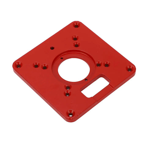 Boss Level Red Aluminum Alloy Router Table Insert Plate With Sweet Slick Surface And Dead Eye Alignment Scale Markings Plus Heavy Duty Guide Rings For Easy Woodworking Bench Upgrades, top view showing flat machined surface and alignment holes.