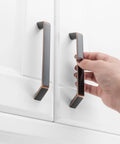 Person installing 10 Pack 5 Inch Oil Rubbed Bronze Cabinet Pulls Set For Kitchen Cabinets Drawers Dresser Vanity Cupboard