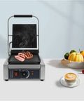 Heavy Duty 1800W Commercial Sandwich Panini Press Grill cooking meat on a flat griddle with adjustable temperature control.