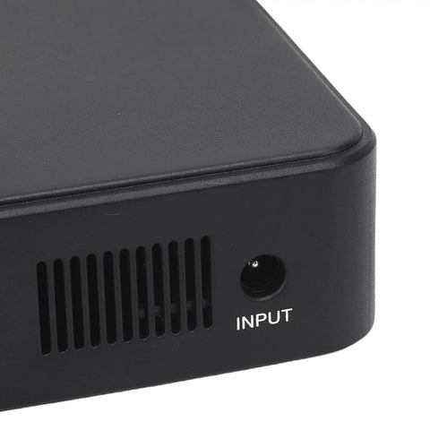 Heavy Duty UPS Power Supply With 18000mAh Battery Backup input port and ventilation slots for cooling.