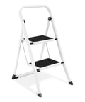 Lightweight 2 Step Folding Ladder For Adults With Anti Slip Pedal And Handrails Portable Steel Step Stool For Kitchen And Home Easy Fold Design Sturdy 330 Lb Capacity White shown unfolded in profile view with black pedals.