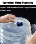 Collapsible Water Jug With Spigot For Camping And Hiking, dispensing water into a glass with a simple press