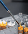 Close-up of brush applying lubricant in Two Layer Switch Lubrication Station For Mechanical Keyboards With Quick 33 Switch Lube Capability
