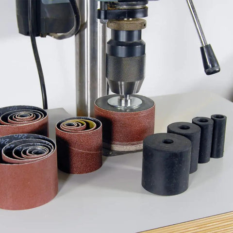 Turn Your Drill Press Into A Dope Power Spindle Sander With 2 Inch Mandrel And Bottom Support For Maximum Rigidity, Includes 5 Piece Sanding Drums And 18 Assorted Sleeves In Coarse Medium Fine Grits, kit displayed on table with drill press and sanding accessories