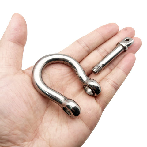 Beefy Heavy Duty Half Inch Screw Pin Anchor Shackle Set 304 Stainless Steel 12mm Bolt Pin Shackles For Chains And Wire Rope Rugged And Corrosion And Moisture Resistant Pack Of 2 shown in hand for size reference