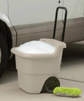 15 Gallon Resin Rolling Lawn And Utility Cart With Retractable Handle And 7 Inch Wheels, Lightweight Yard Hauler beside vehicle