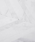 Close-up of Herringbone Peel And Stick Backsplash Tiles White Marble Look PVC 12x12 Inch with water droplets on surface.