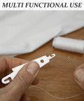 On-The-Go Portable Stainless Steel Needle Threader Set For Seniors And Beginners, 60-Piece Hand Sewing Tool With Easy Threading And Deformation-Resistant Design, Great For Embroidery And Quick Fixes, showing a hand threading a needle