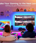 Two people gaming using LED TV Backlight Strip For 32 To 70 Inch Screens Easy Install App Controlled Bluetooth Setup