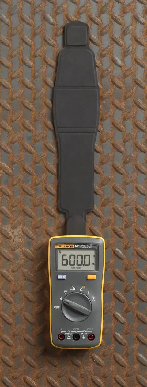 Palm Sized Digital Multimeter For On The Go Tech Work Measures Voltage Resistance Continuity And Capacitance With 10A Current Data Hold Lightweight About 200 Grams CAT III 600V Safety Rating Slim Pocket Tool For Quick Troubleshooting on metal surface