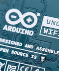 Close-up of Uno R4 WiFi Dual Core Microcontroller Board with Renesas RA4M1 and ESP32 S3 for IoT and embedded projects.