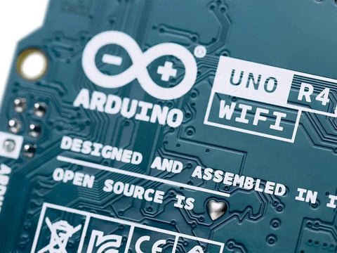 Close-up of Uno R4 WiFi Dual Core Microcontroller Board with Renesas RA4M1 and ESP32 S3 for IoT and embedded projects.