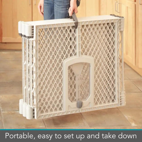 Person holding folded Six Panel Petyard Passage Dog Playpen Fence with Wall Mount Kit, portable and light gray