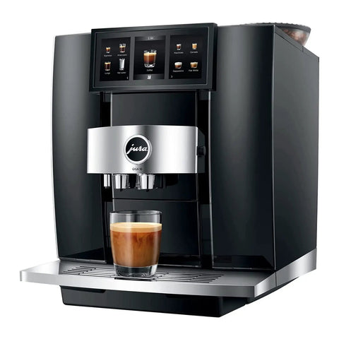 Top Shelf Fully Automatic Commercial Coffee Station Featuring Six Point Seven Inch Touchscreen Interface with a glass of espresso below.
