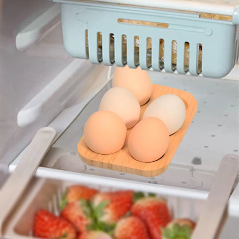 Organic Bamboo Deviled Egg Platter Featuring Six Secure Grid Wells For Fridge Storage And Kitchen Countertop Use with five eggs.