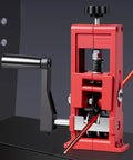 Heavy Duty Manual Double Drive Wire Stripper Machine with hand crank for copper cable processing, red steel construction.