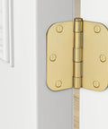 Gold door hinge attached to a white door with 5/8 radius corner, showcasing smooth quiet closing from 30 Pack Beefy Brushed Nickel Door Hinges For Interior Doors 3.5 Inch With 5/8 Radius Corner Removable Pin Satin Nickel Silver Durable Rust Resistant Heavy Duty Smooth Quiet Closing