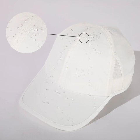 White UPF 50 Plus Ponytail Baseball Cap For Women Size Small Medium with water droplets showing instant dry cooling tech