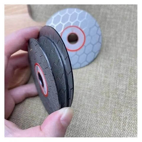 65mm Diamond Cutting Disc For Dry And Wet Grinding, Double Sided Saw Blade For Ceramic Tile And Granite, Diamond Grinding Plate, Pro Grade, Heavy Duty, Durable Grinder Tool For Smooth Flat Cuts, shown held by hand