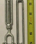 Heavy Duty Indoor Outdoor Cable Kit For Baseball And Softball Batting Cages With Three Half Inch Eye Jaw Turnbuckles next to ruler