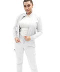 Womens Zip Front Medical Scrub Jacket Crisp White Nurse Uniform Top Straight Up Professional Healthcare Workwear With Slick Closure And All Day Comfy Support For Clinical Rounds In Large worn by model, featuring sleek design and dual pockets.